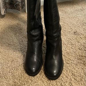 Black leather boots. Knee length!